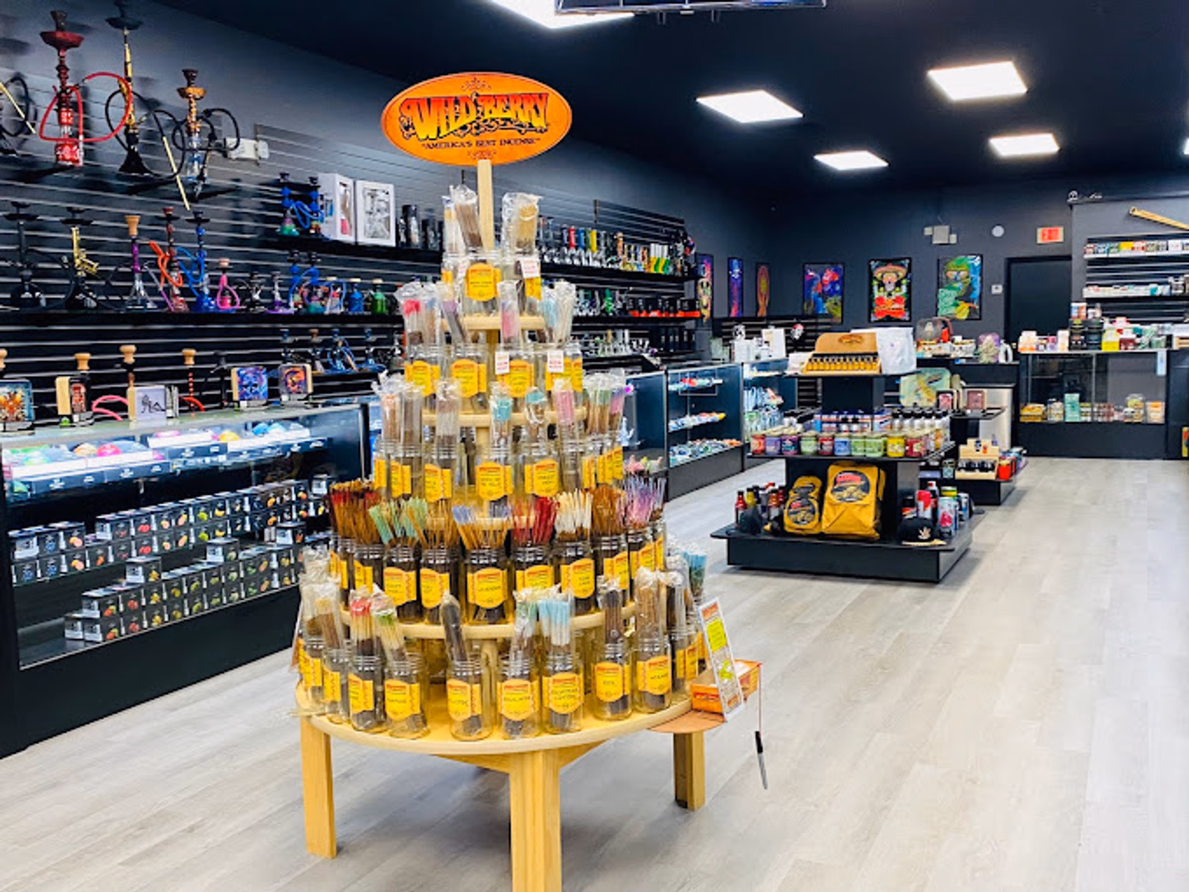 Wild Berry incense display stand in the middle of the sales floor at Metro Smoke Shop, Mount Dora